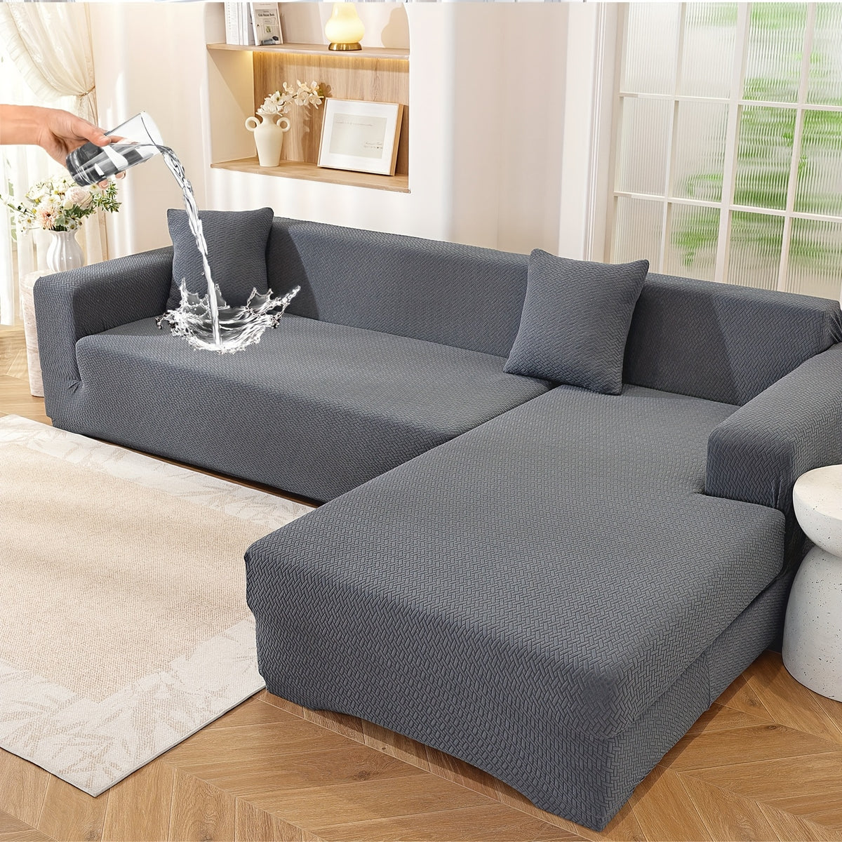 Housse de canapé extensible en polaire jacquard à housses séparées, détail de l'ourlet