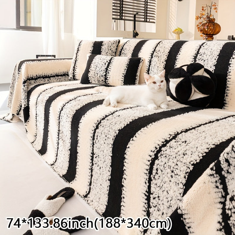 Housse de canapé aspect bouclette, gros plan sur le tissu