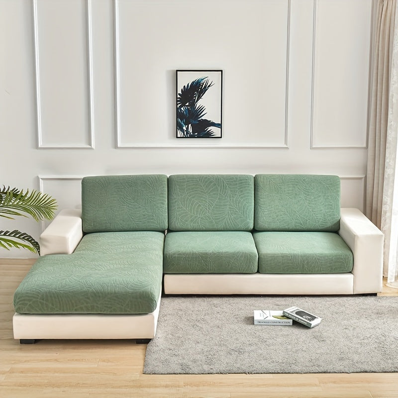 Housse de canapé épaisse extensible en polaire jacquard à motif feuillage, gros plan sur le tissu