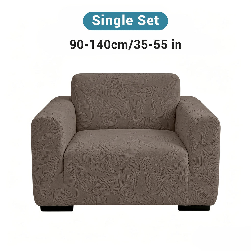 Housse de canapé extensible en polaire jacquard à motif feuillage, gros plan sur le tissu