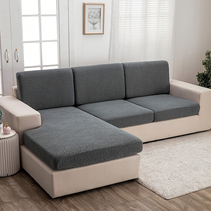 Housse de canapé extensible en polaire jacquard à motif feuillage à housses, détail de la finition