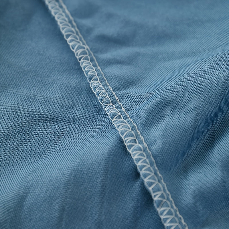 Housse de canapé en polaire jacquard à volants, gros plan sur le tissu