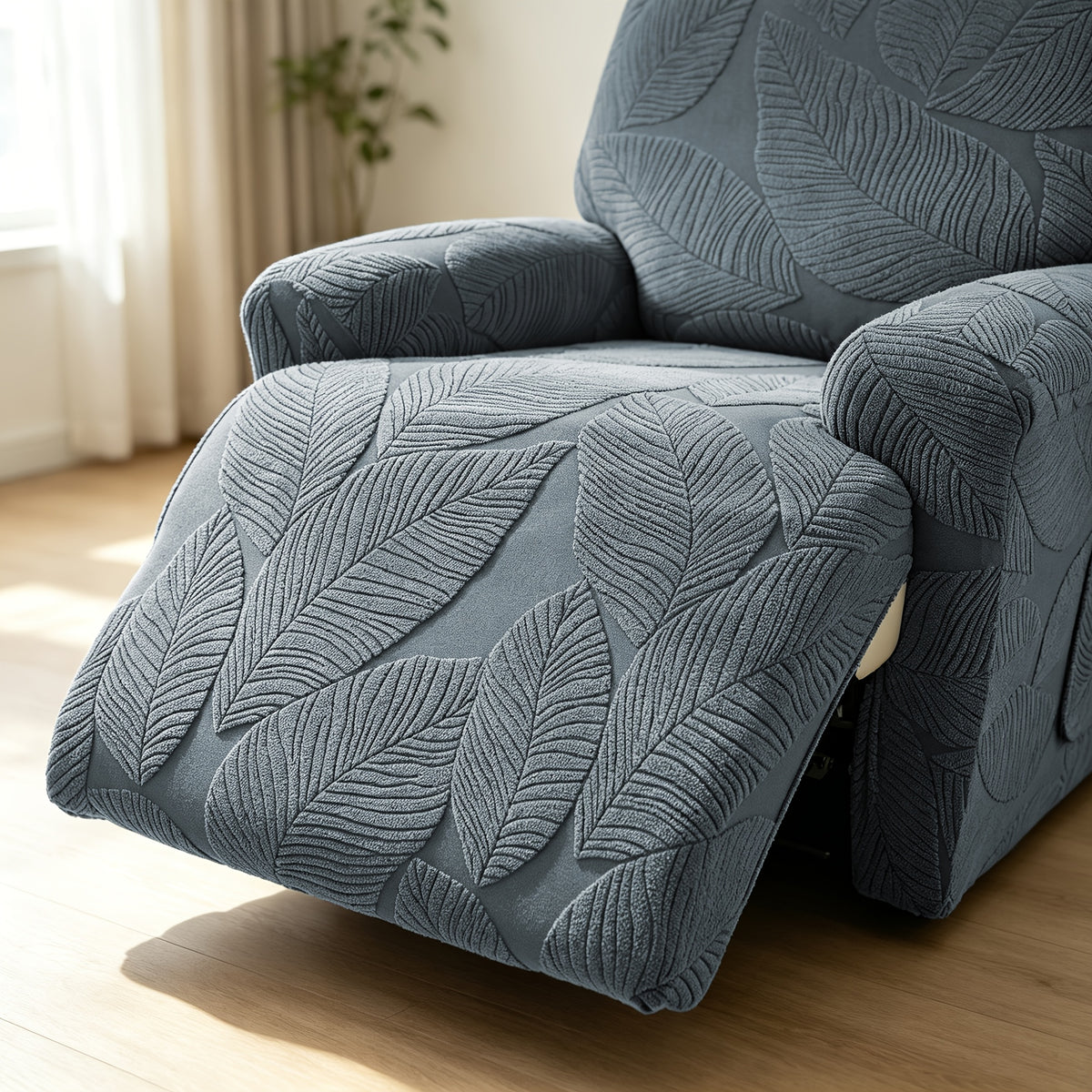 Housse de chaise extensible en polaire jacquard à motif feuillage, détail de l'ourlet