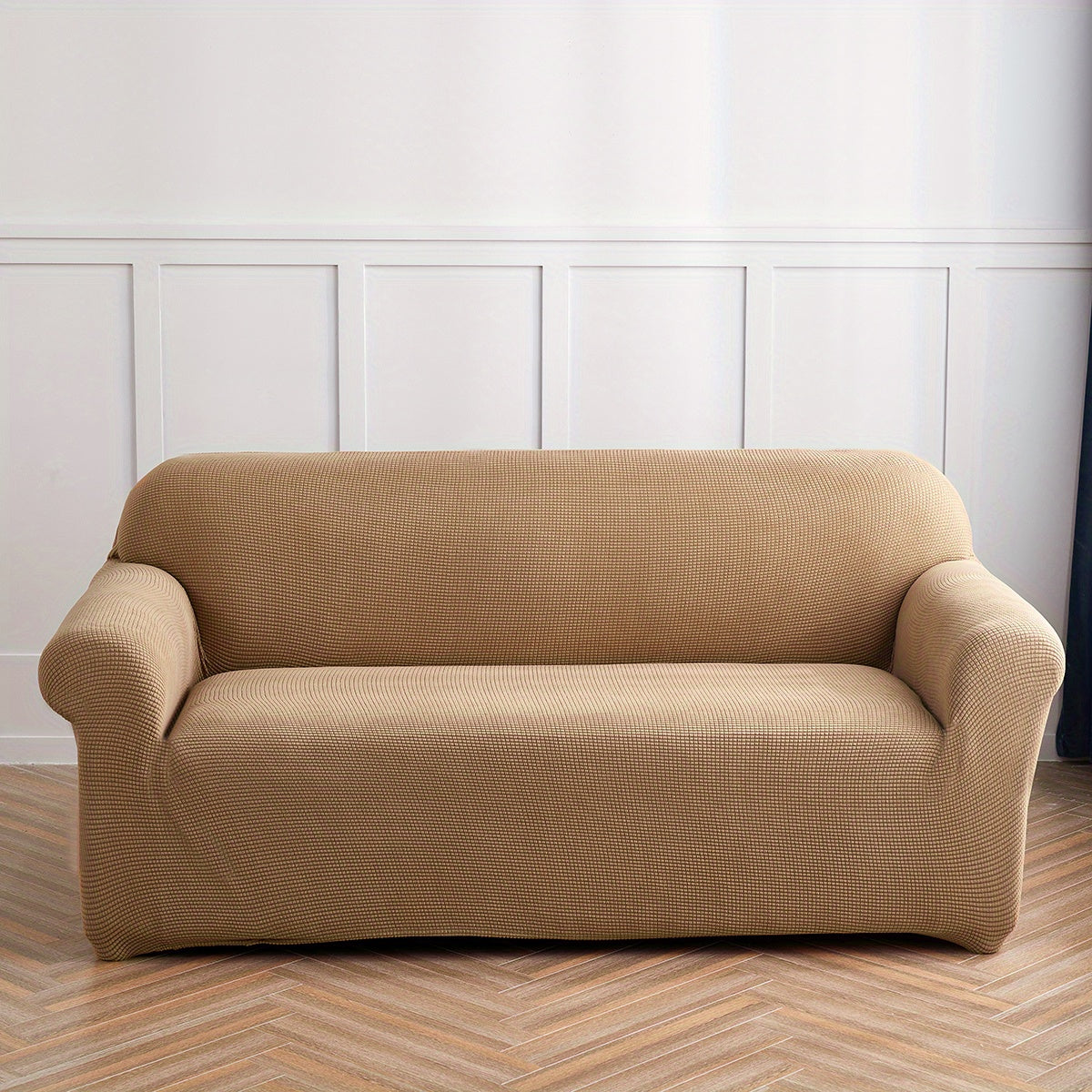 Housse de canapé extensible en polaire matelassée antidérapante, détail de la finition