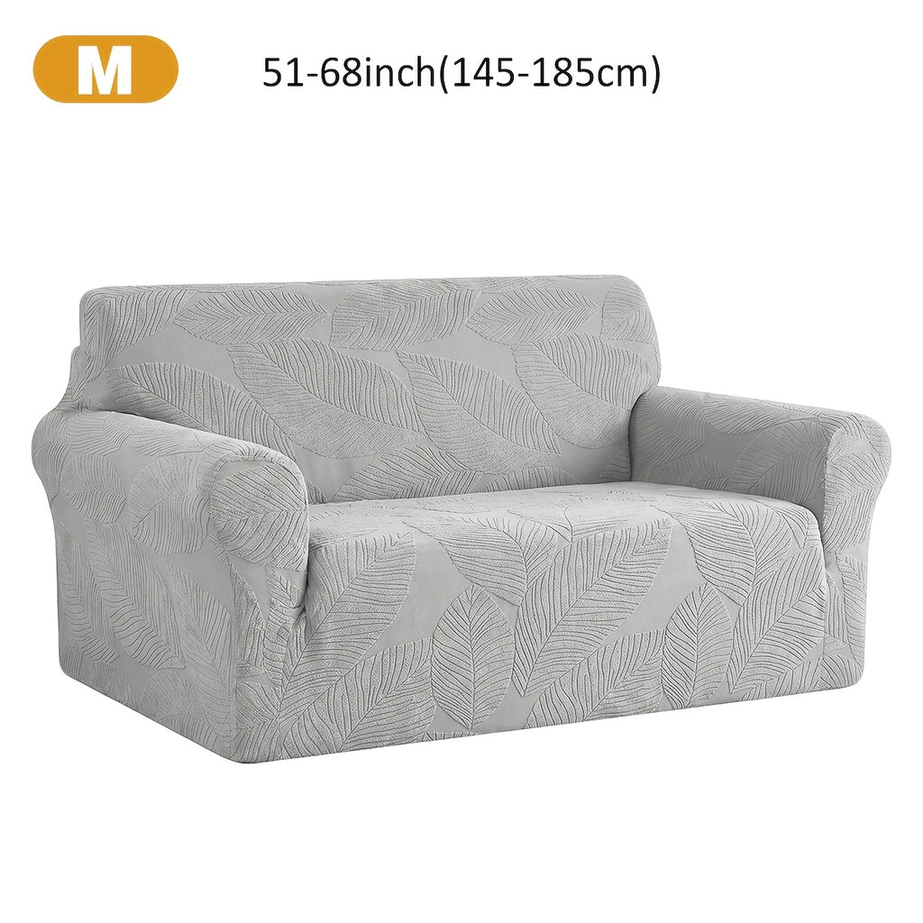 Housse de canapé extensible en polaire jacquard à motif feuillage, mise en situation