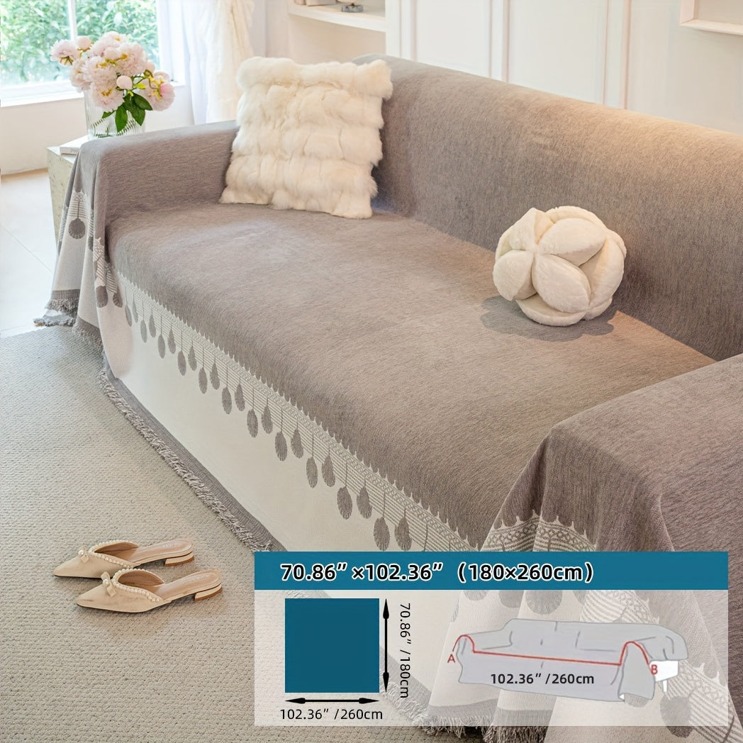 Housse de canapé en chenille jacquard à volants d'esprit bohème, gros plan sur le tissu