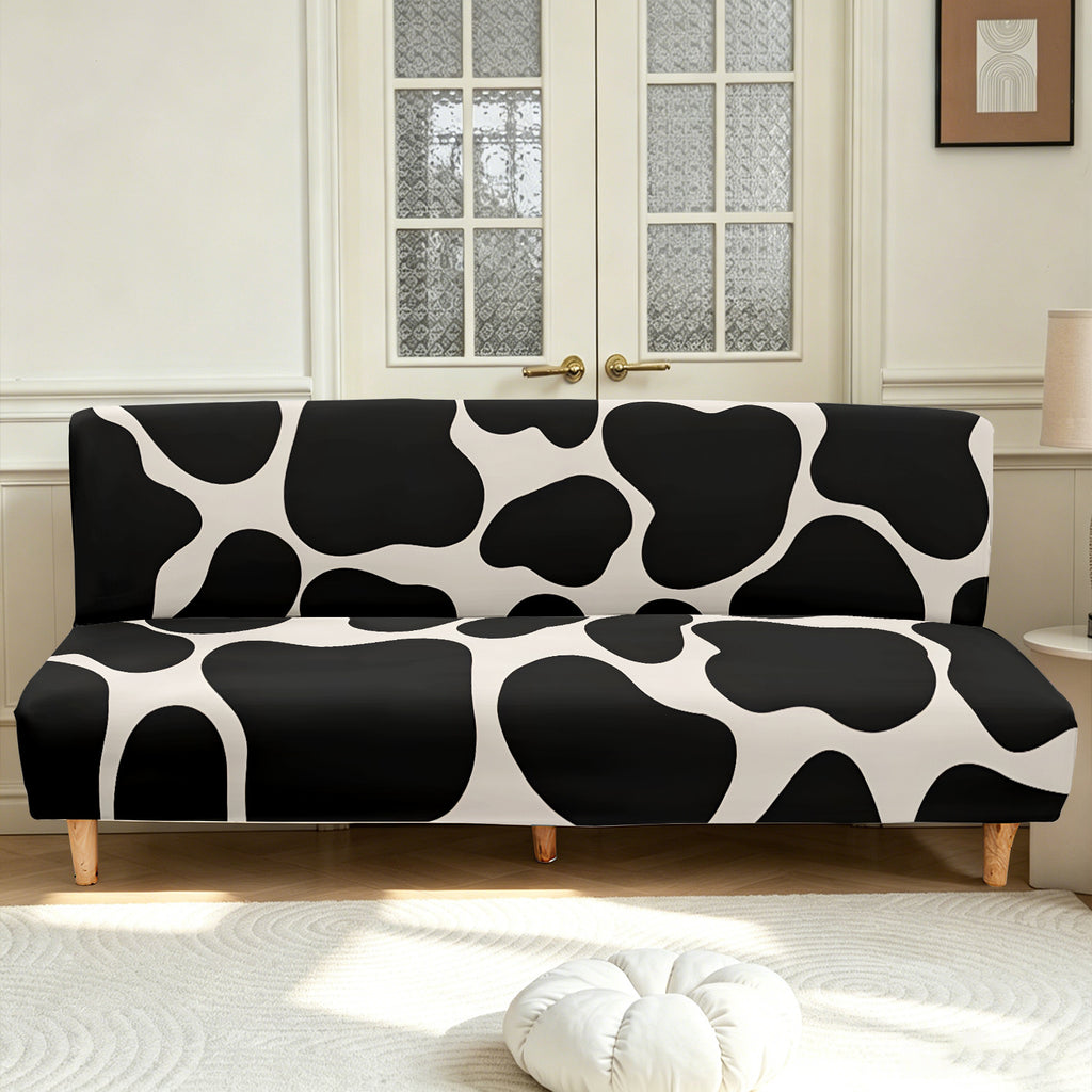 Housse de canapé extensible en fibre de lait imprimée à motif vache — détail de la matière : fibre de lait