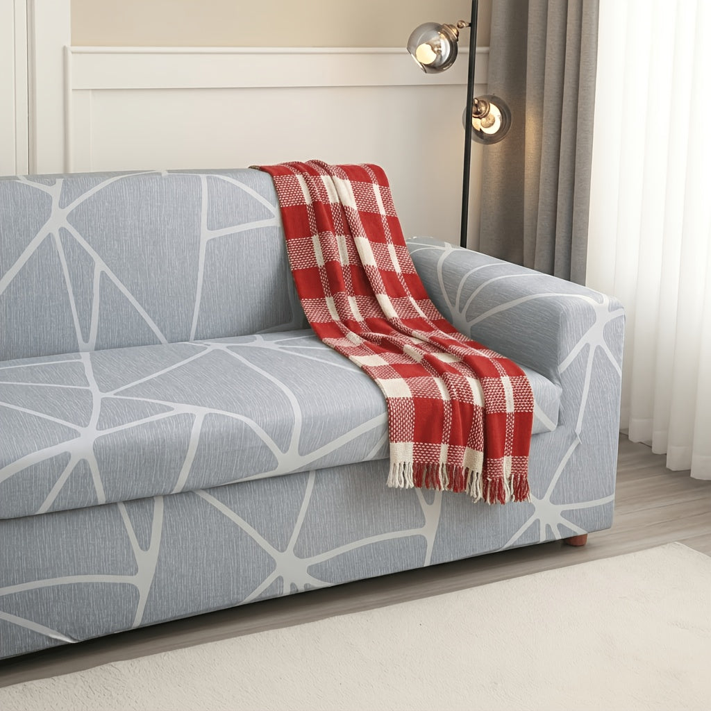 Housse de canapé en velours pour canapé trois places au rendu glamour, gros plan sur le tissu