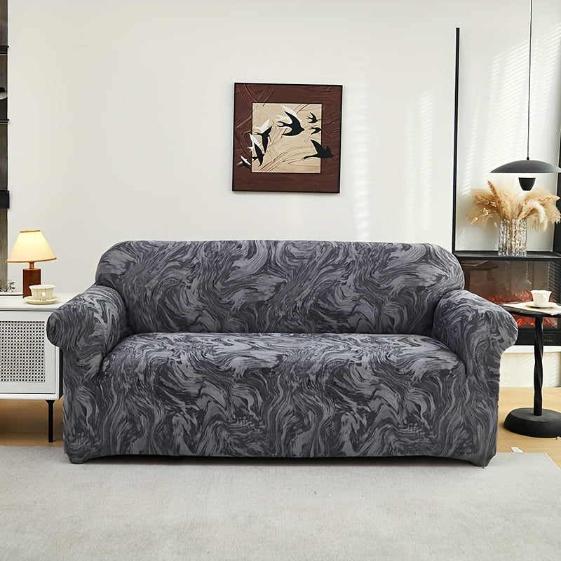 Housse de canapé extensible en fibre de lait matelassée à motif tropical, détail de la finition