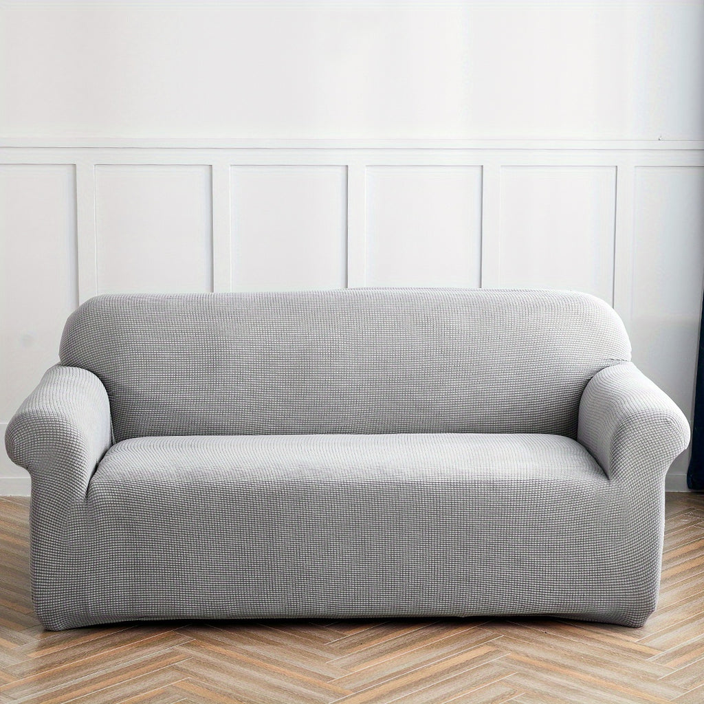 Housse de canapé extensible en polaire matelassée antidérapante, gros plan sur le tissu