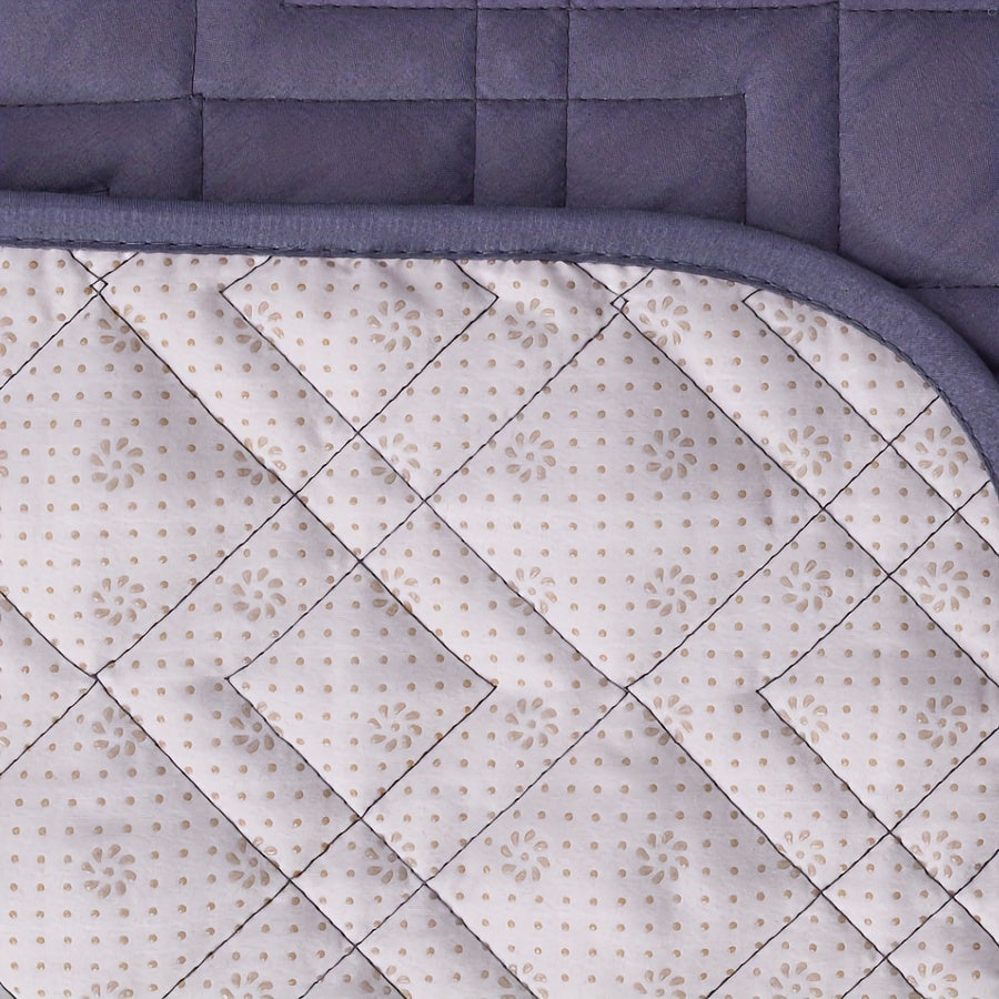 Housse de fauteuil matelassée antidérapante pour fauteuil, détail de l'ourlet