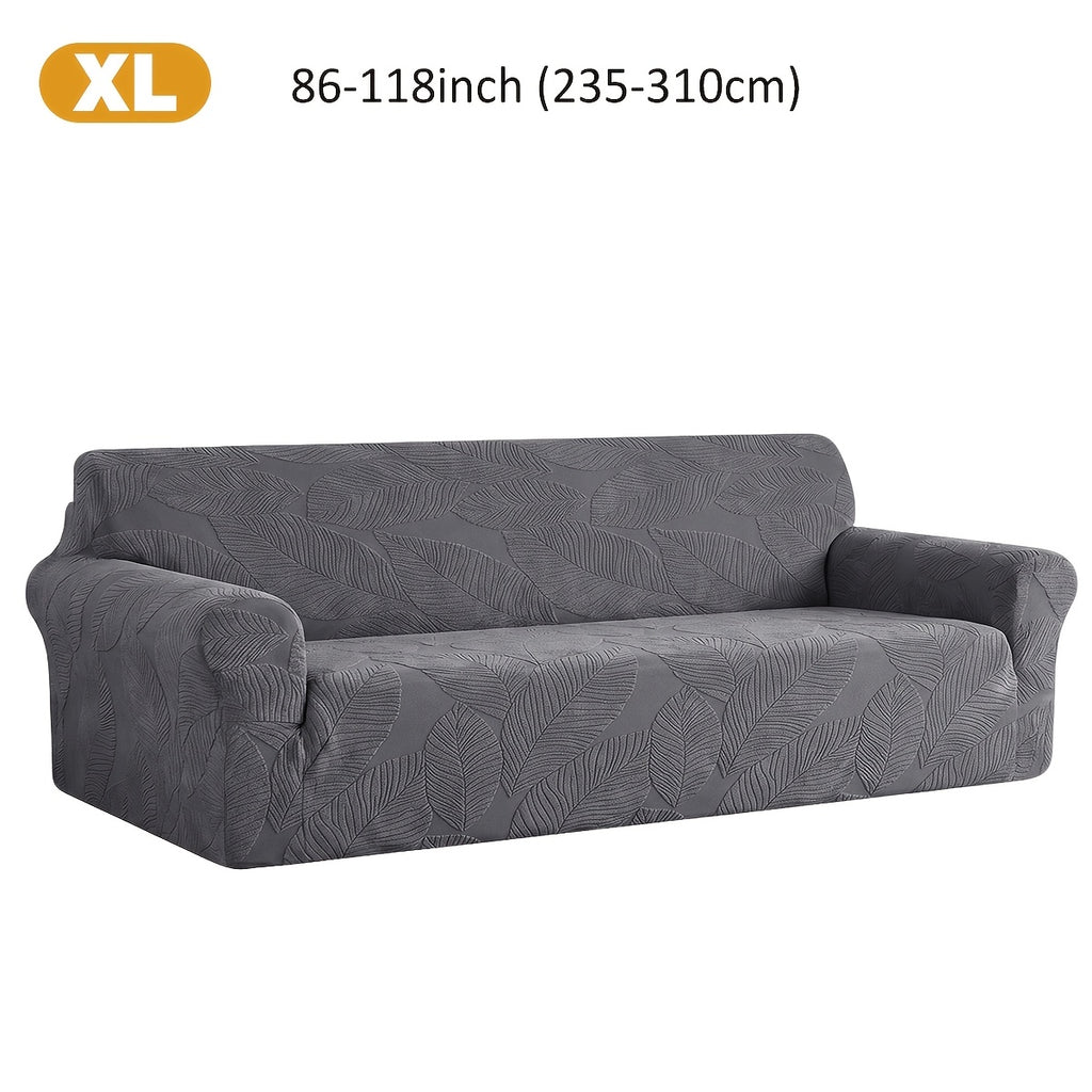 Housse de canapé extensible en polaire jacquard à motif feuillage, détail de la finition