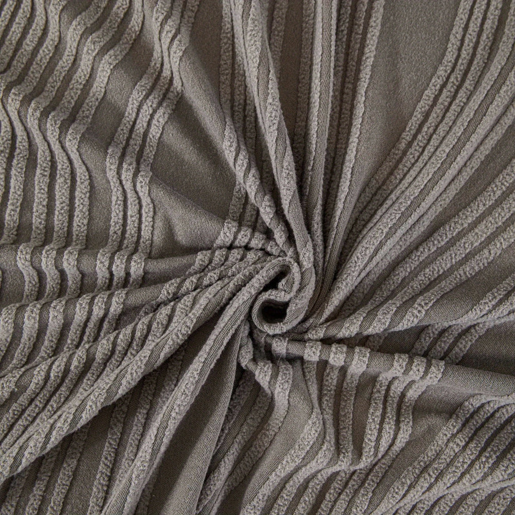Housse de canapé en peluche jacquard, détail de l'ourlet