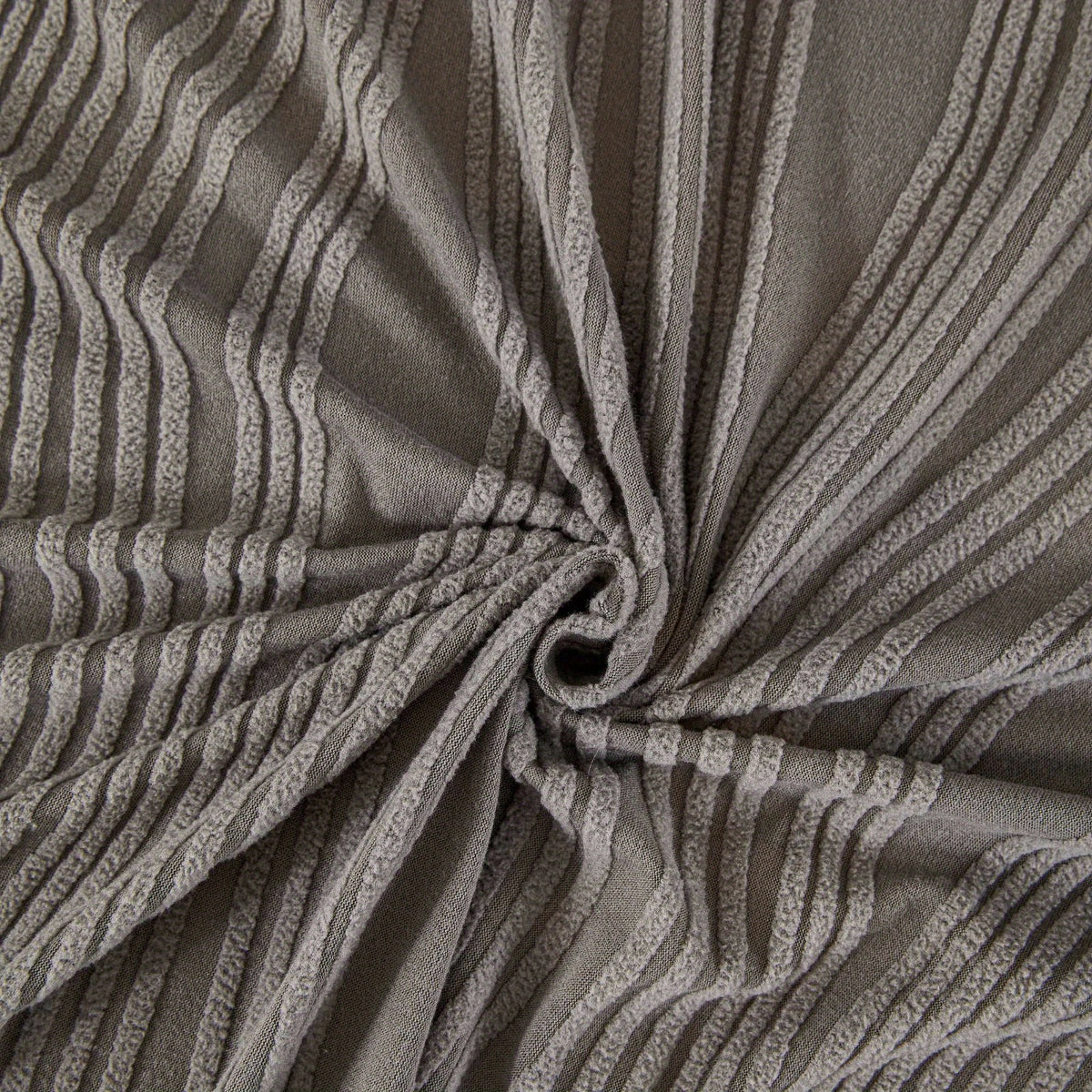 Housse de canapé en peluche jacquard, détail de l'ourlet