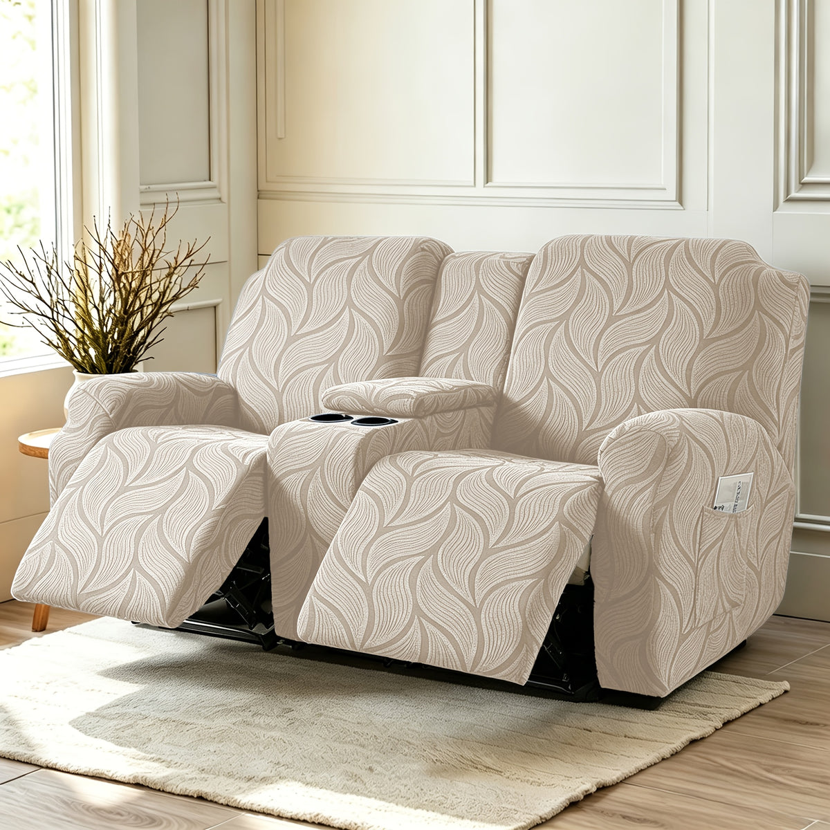 Housse de canapé extensible en polaire jacquard à motif feuillage, détail de l'ourlet