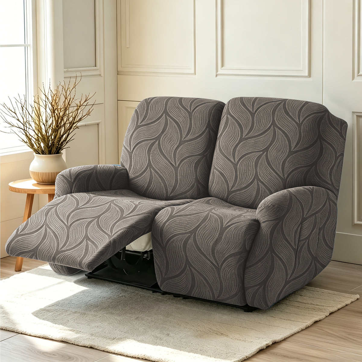 Housse de canapé extensible en polaire jacquard à motif feuillage, détail de la finition