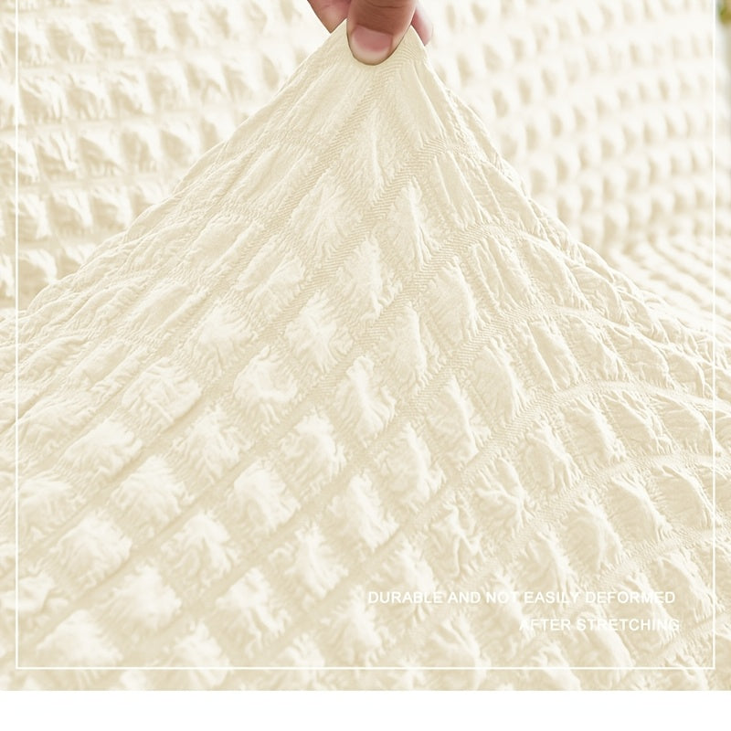 Housse de canapé extensible en jacquard à volants — détail de la matière : jacquard