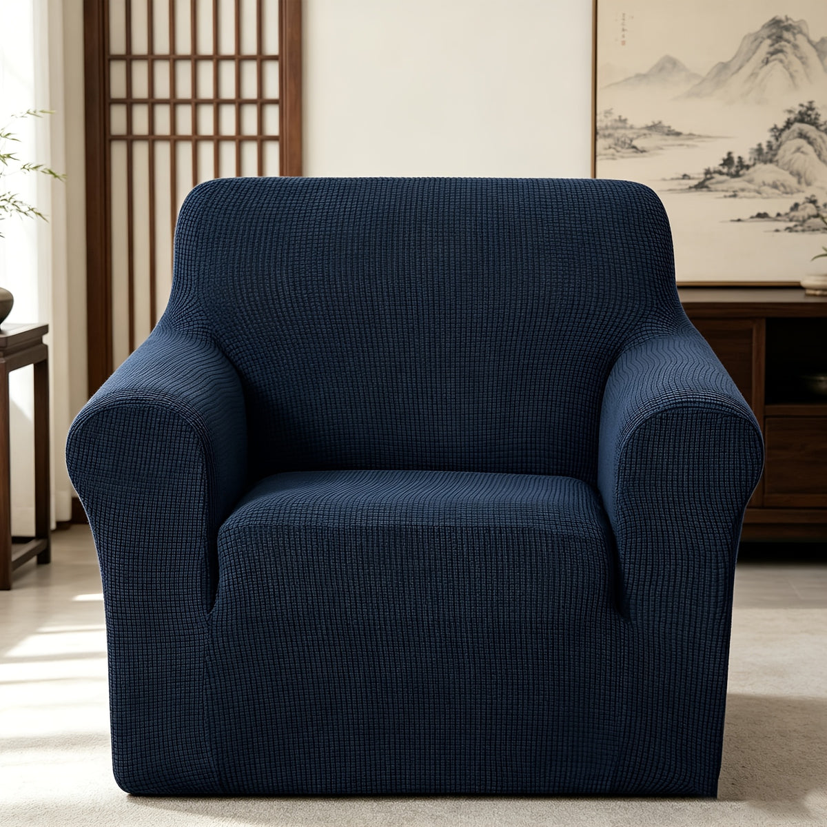 Housse de canapé extensible en polaire jacquard à rayures, détail de l'ourlet