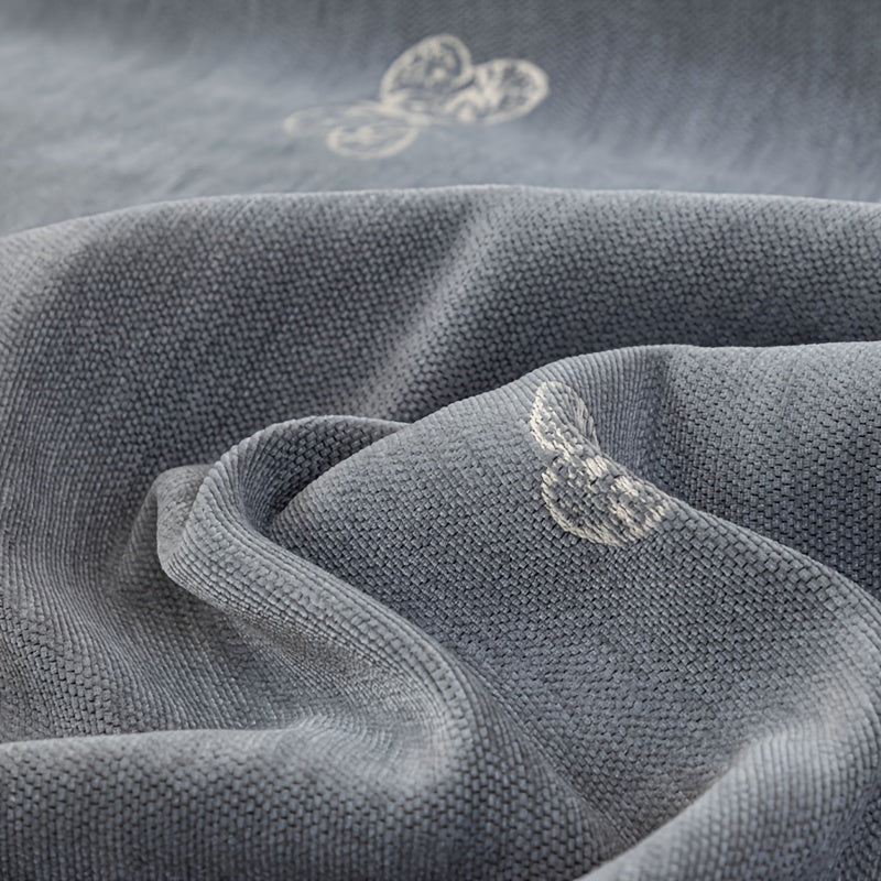 Housse de canapé en chenille jacquard d'esprit vintage, gros plan sur le tissu
