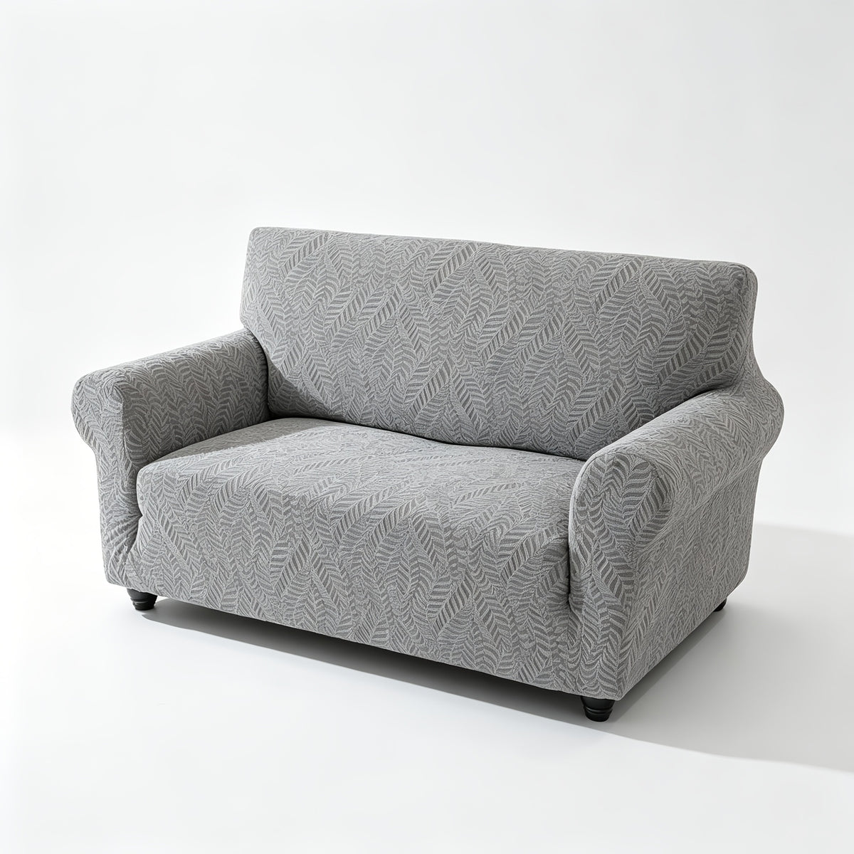 Housse de canapé extensible en polaire jacquard à motif feuillage anti-griffes, mise en situation