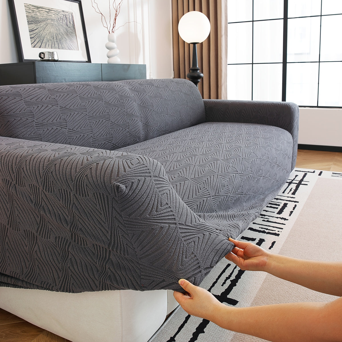 Housse de canapé extensible en polaire jacquard à rayures antidérapante, gros plan sur le tissu