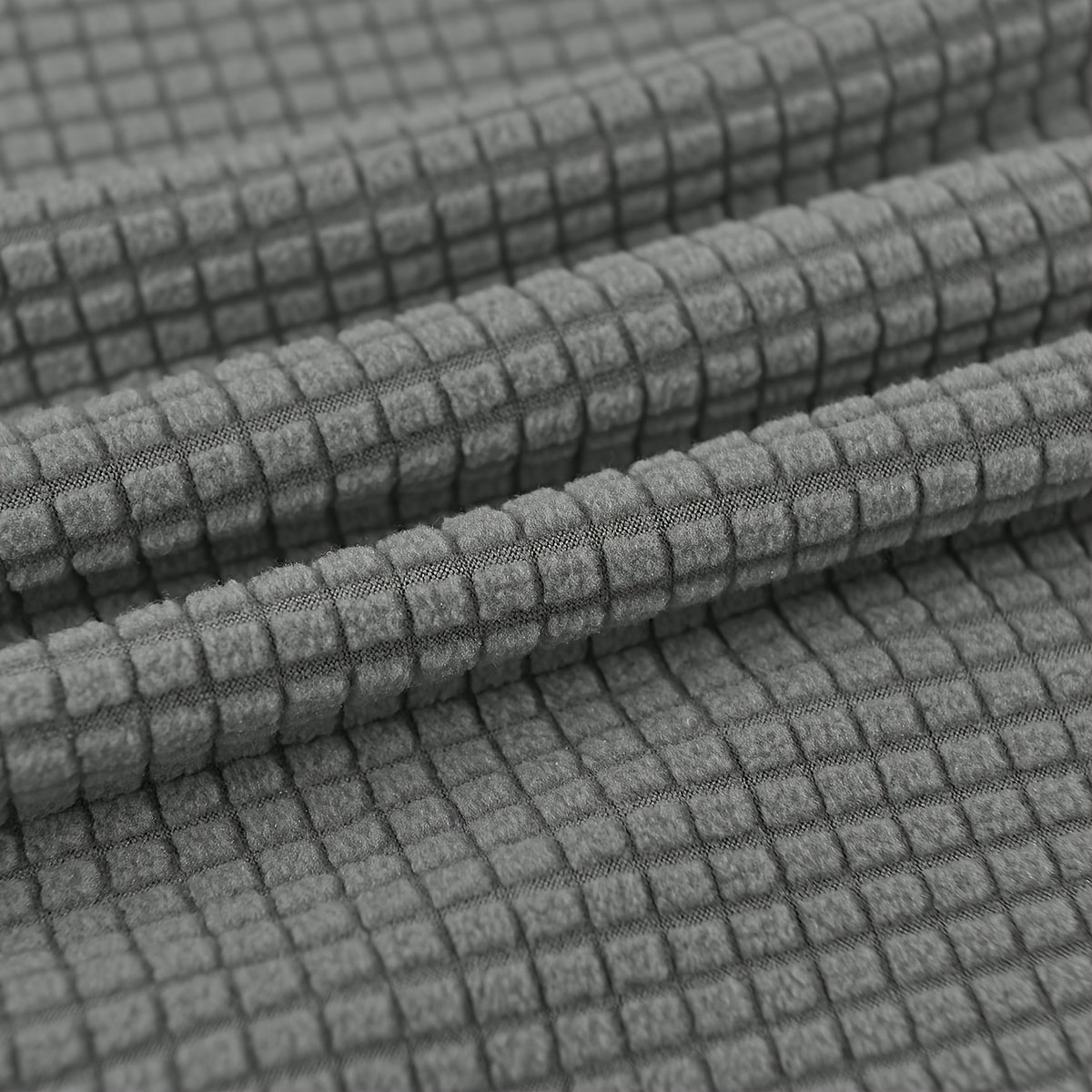 Housse de canapé épaisse extensible en velours côtelé jacquard pour fauteuil, détail de l'ourlet