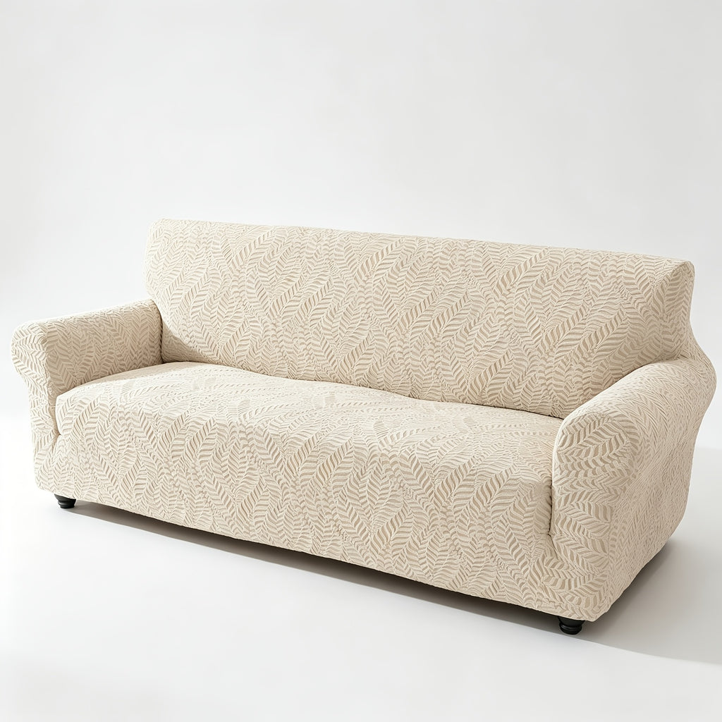 Housse de canapé extensible en polaire jacquard à motif feuillage anti-griffes, détail de l'ourlet