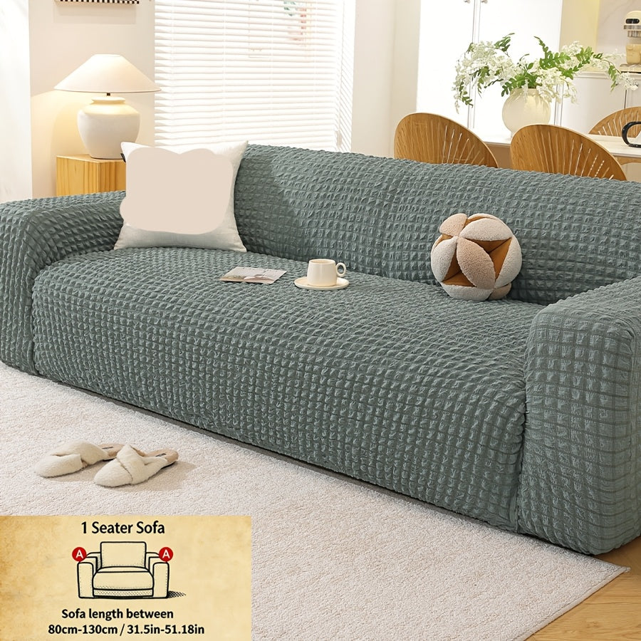 Housse de canapé épaisse extensible en polyester, gros plan sur le tissu