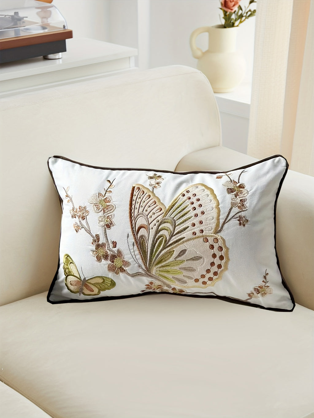 Housse de coussin d'esprit campagne, gros plan sur le tissu