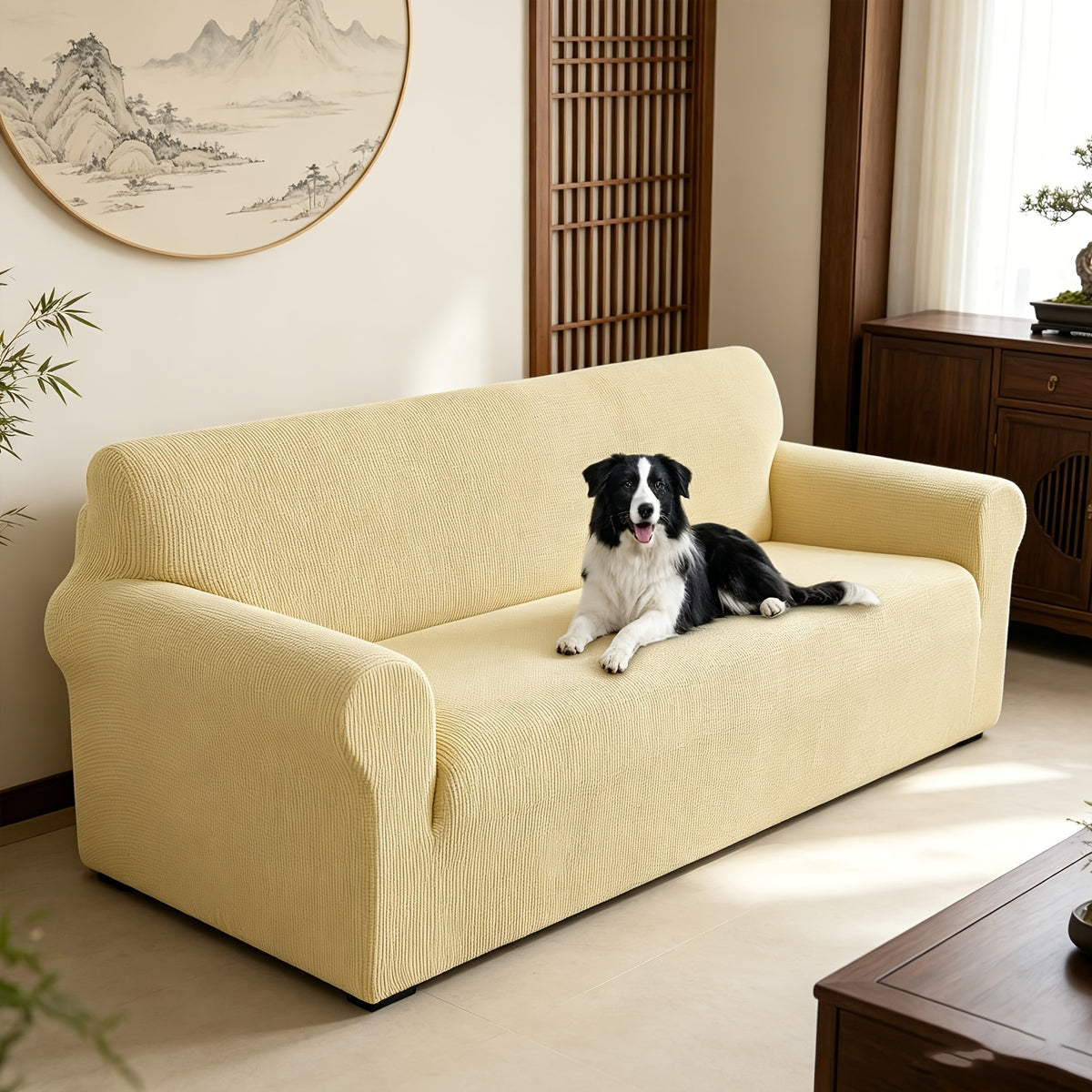Housse de canapé extensible en polaire jacquard à rayures, détail de l'ourlet