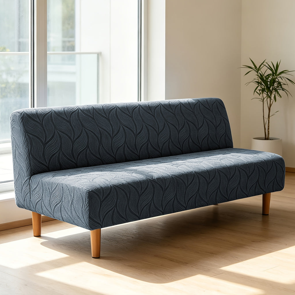 Housse de canapé extensible en polaire jacquard sans accoudoirs, détail de l'ourlet