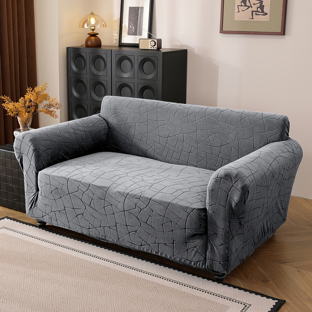 Housse de canapé extensible en polaire jacquard à motif géométrique à housses — détail de la matière : polaire