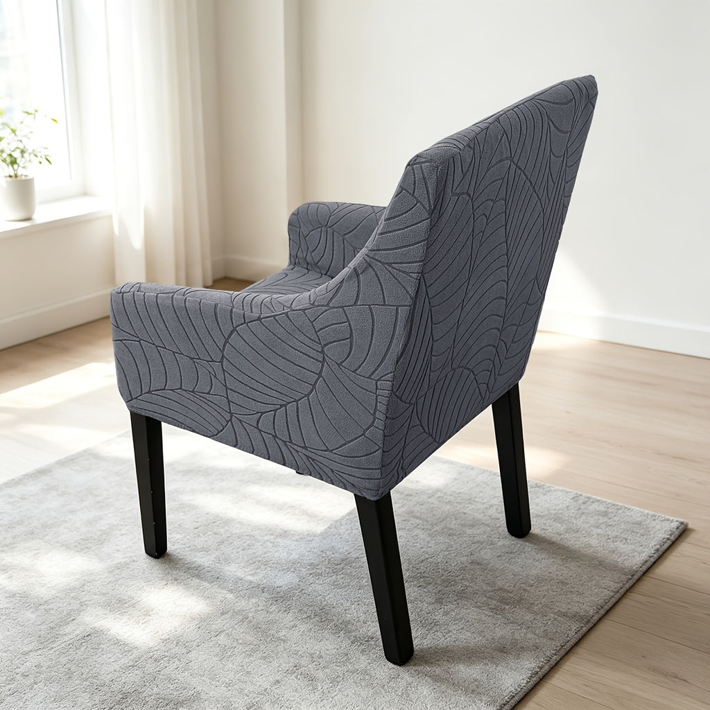 Housse de chaise extensible en velours côtelé jacquard à motif feuillage, détail de l'ourlet
