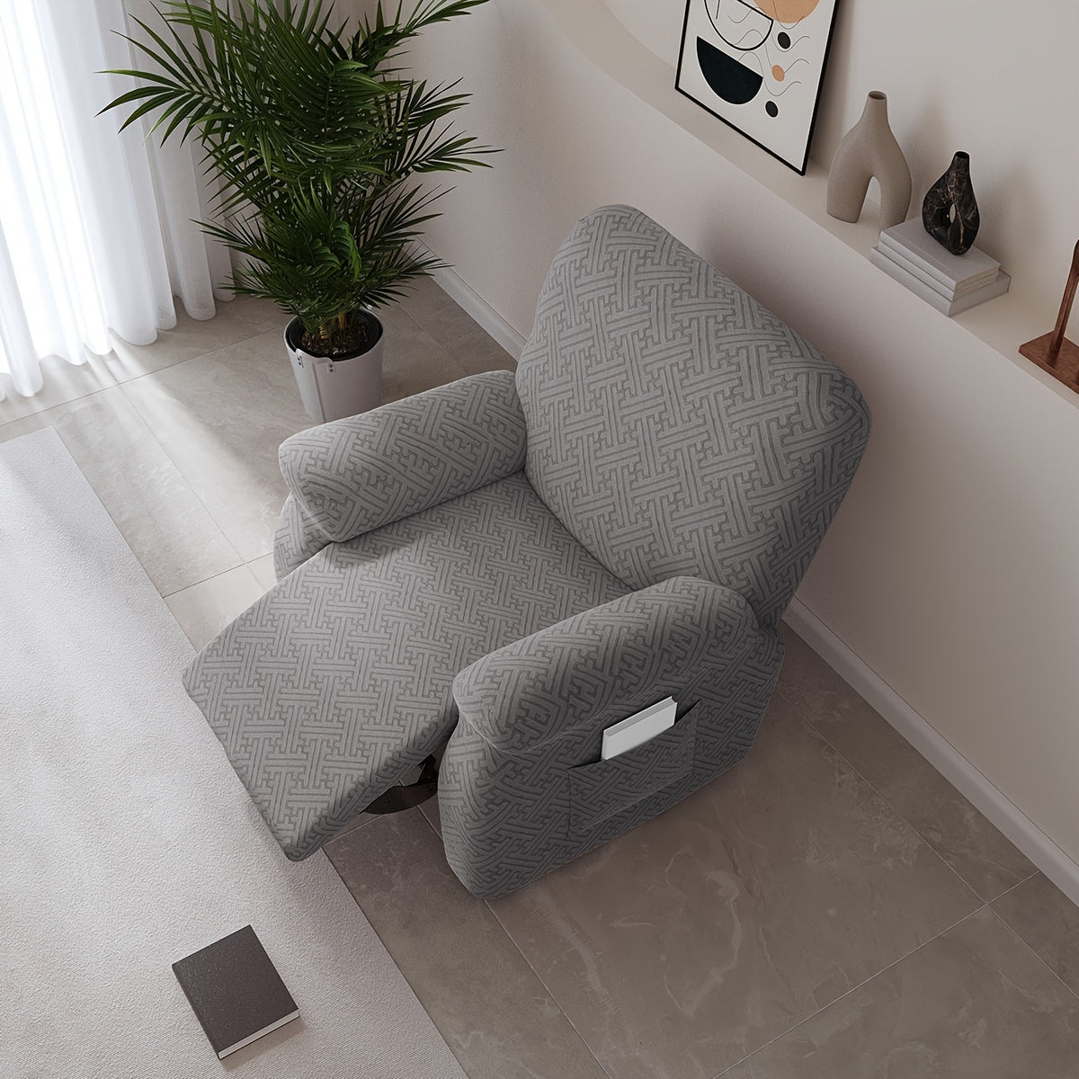 Housse de canapé extensible en polaire jacquard, détail de l'ourlet