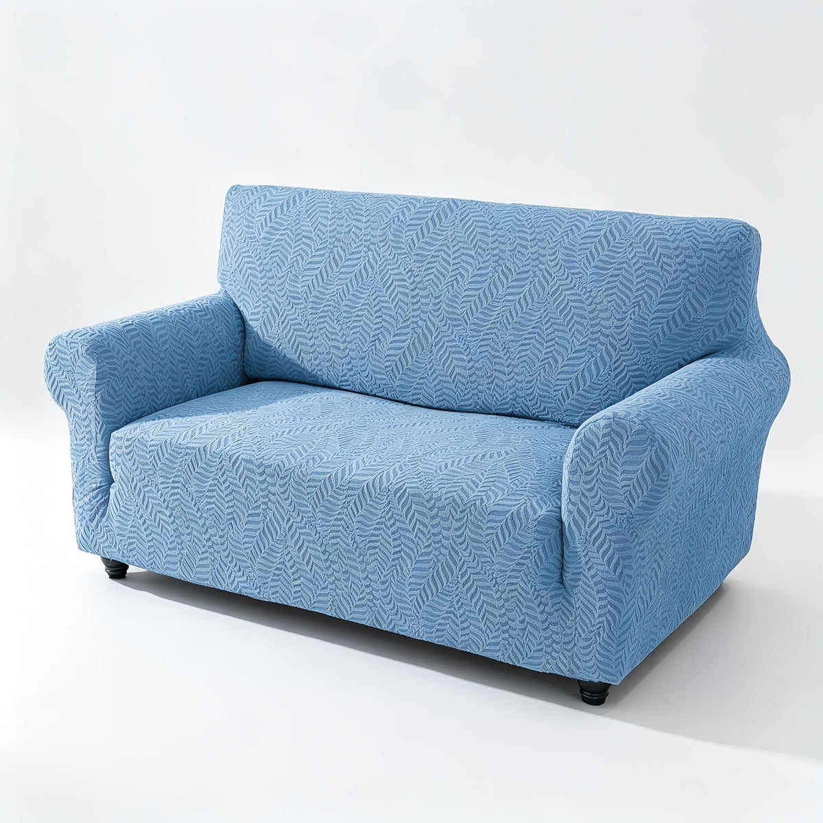 Housse de canapé extensible en polaire jacquard à motif feuillage anti-griffes, détail de la finition
