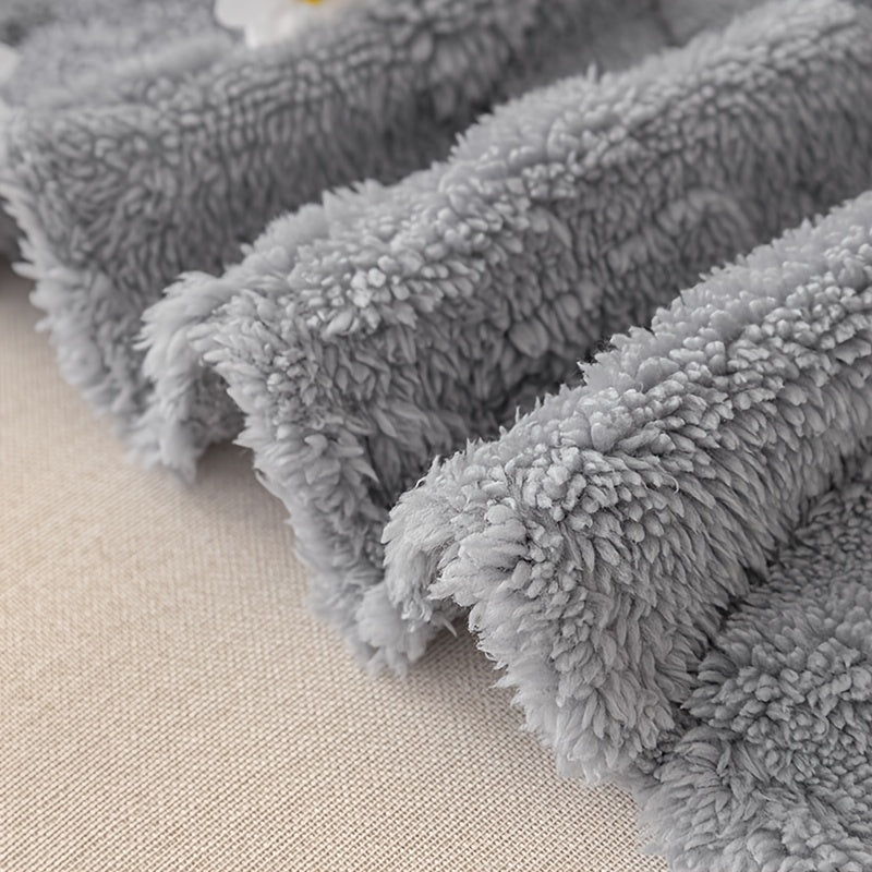 Housse de canapé en peluche à motif feuillage antidérapante, vue d'ensemble