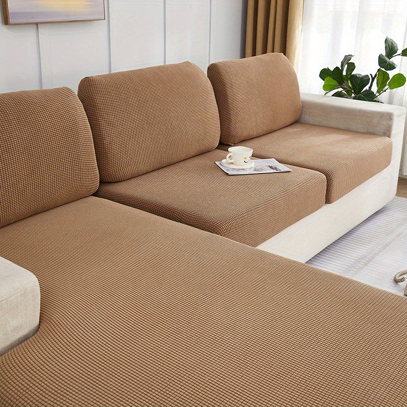 Housse de coussin extensible en polaire matelassée, détail de l'ourlet