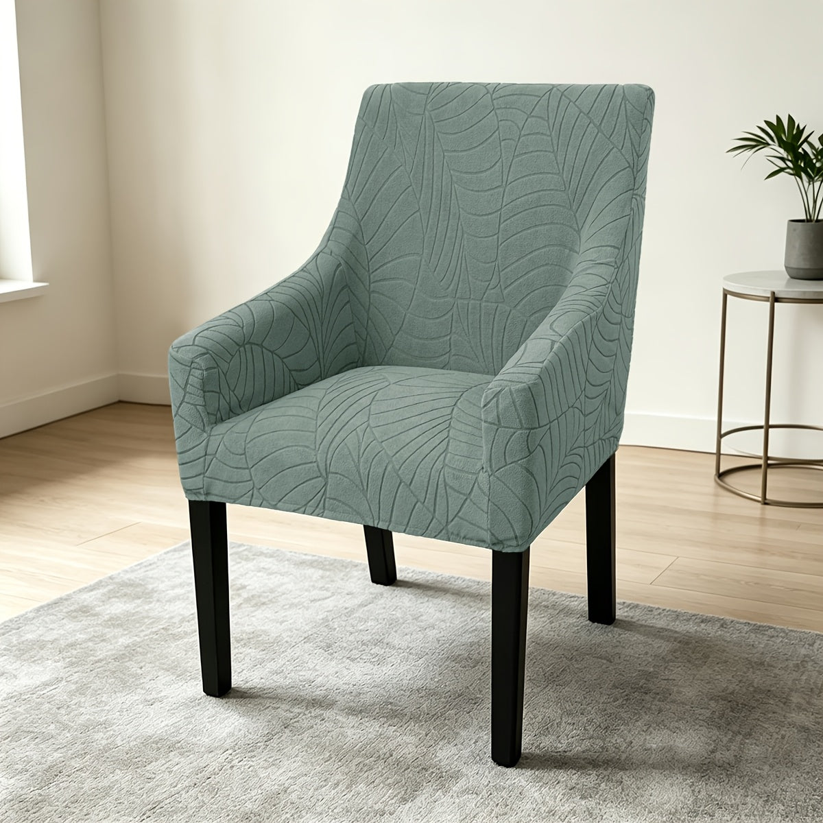 Housse de chaise extensible en velours côtelé jacquard à motif feuillage, détail de la finition