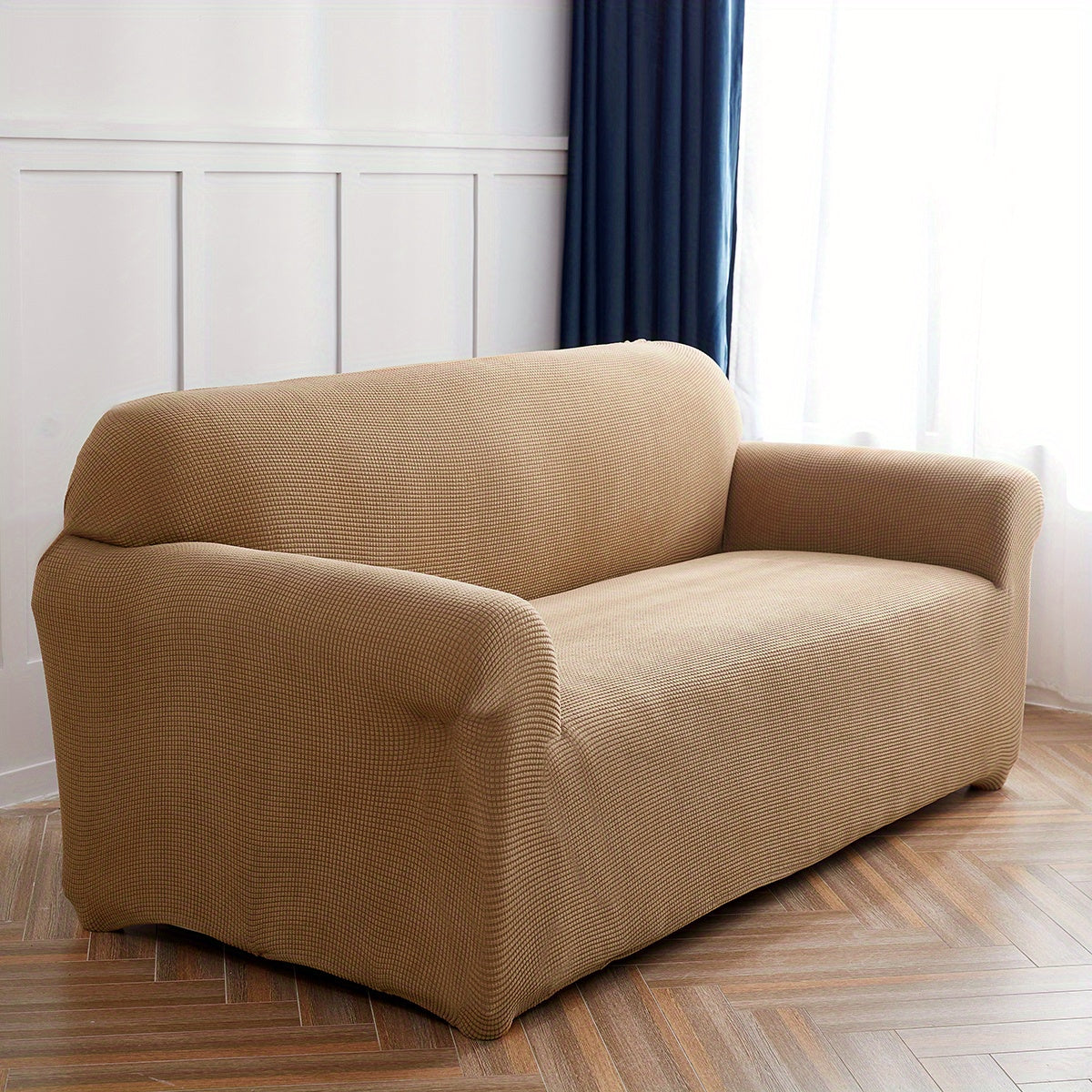 Housse de canapé extensible en polaire matelassée antidérapante, gros plan sur le tissu