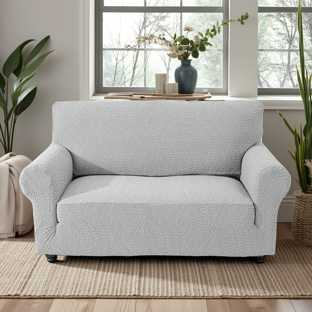 Housse de canapé extensible en polaire jacquard, détail de l'ourlet