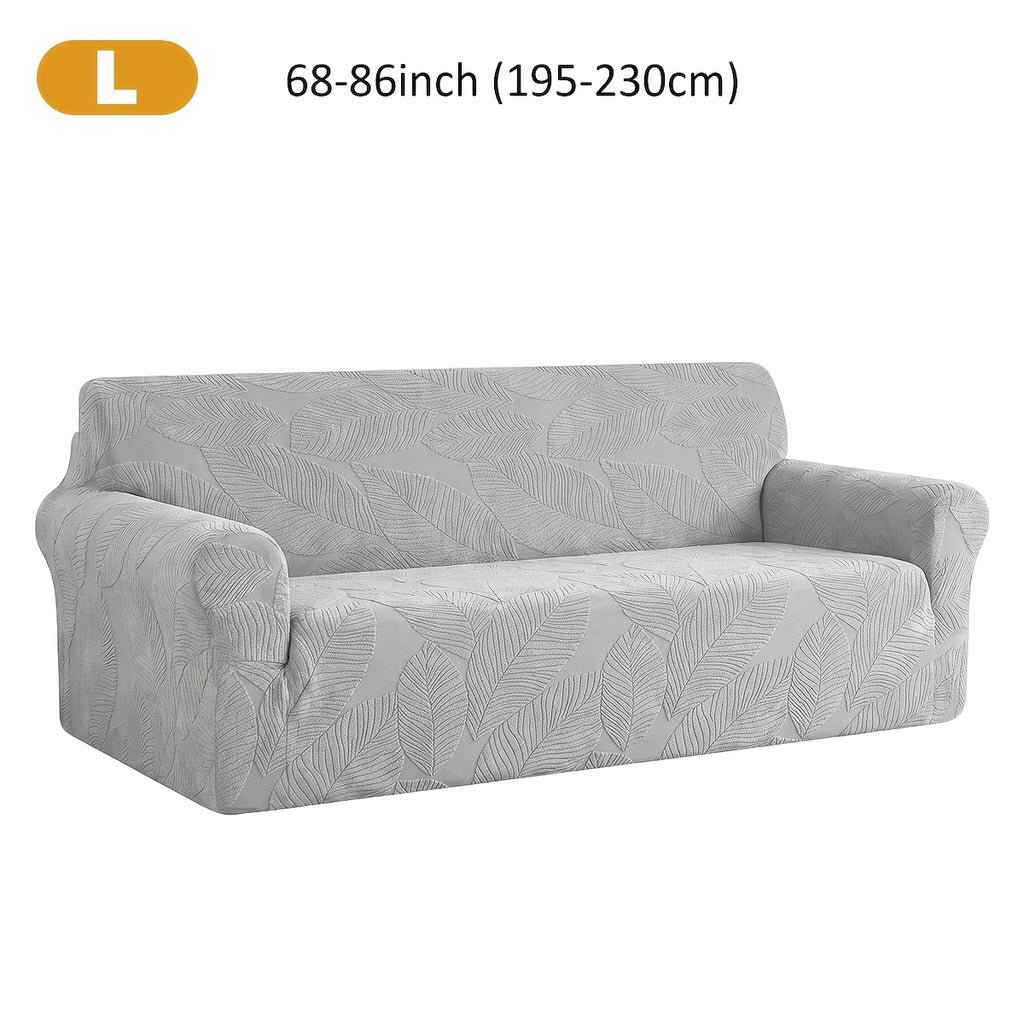Housse de canapé extensible en polaire jacquard à motif feuillage, gros plan sur le tissu